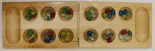 320px-Wooden_Mancala_board.jpg