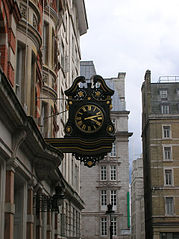 Clock_in_Southampton_Street_WC2_-_geograph.org.uk_-_1276671.jpg
