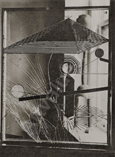Marcel_Duchamp,_photo_Man_Ray,_391_n._13,_July_1920.jpg